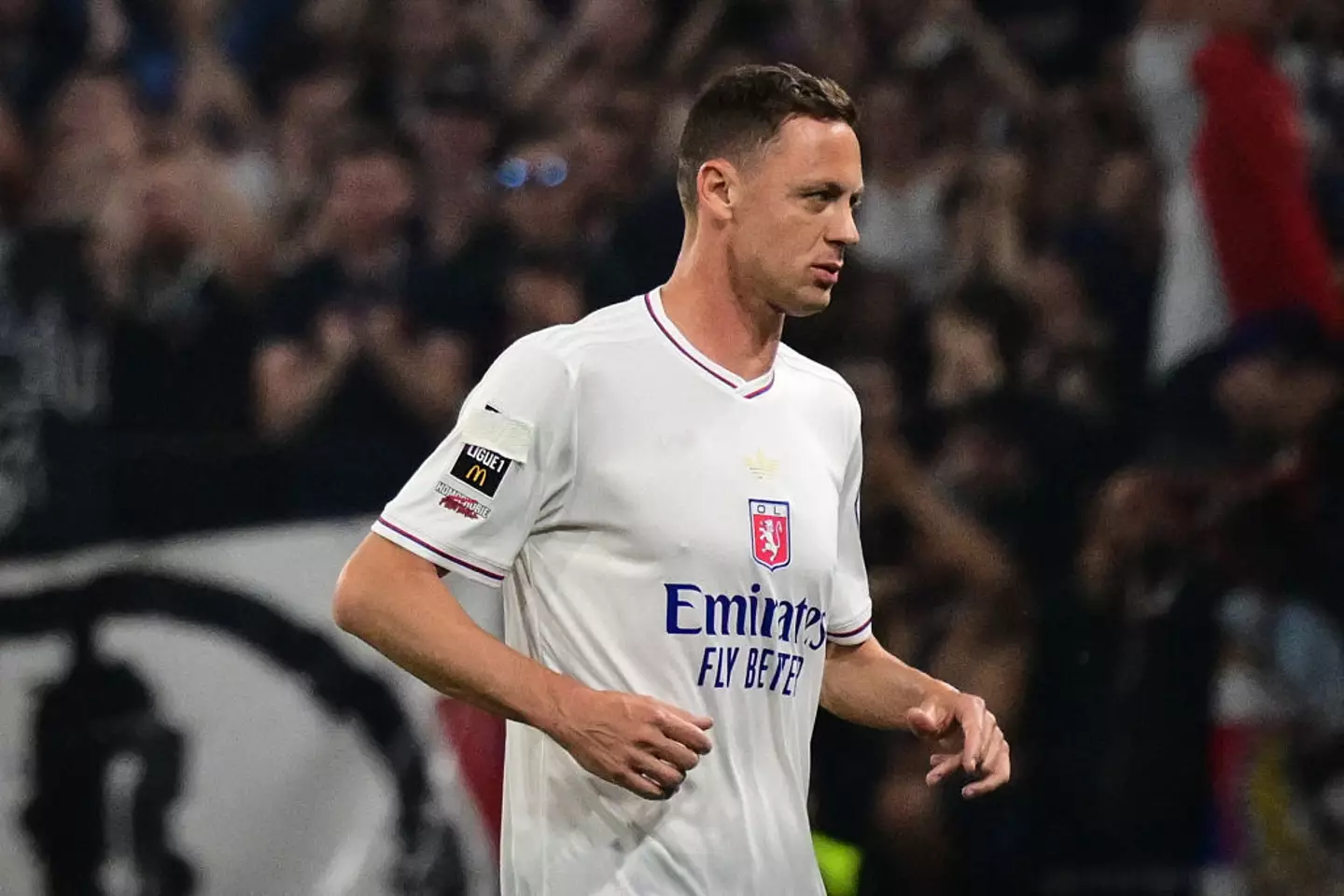 Nemanja Matic covered the anti-homophobia badge on his Lyon kit during the Ligue 1 match against Angers. (Image: Getty)
