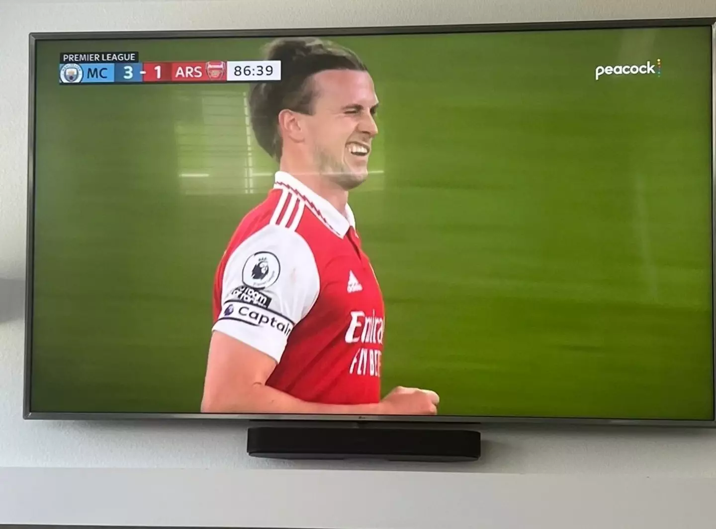 Rob Holding winked after scoring against Manchester City. Image: via Twitter/Premier League 
