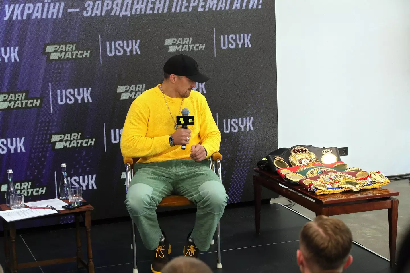 Oleksandr Usyk and his world titles. Image: Alamy