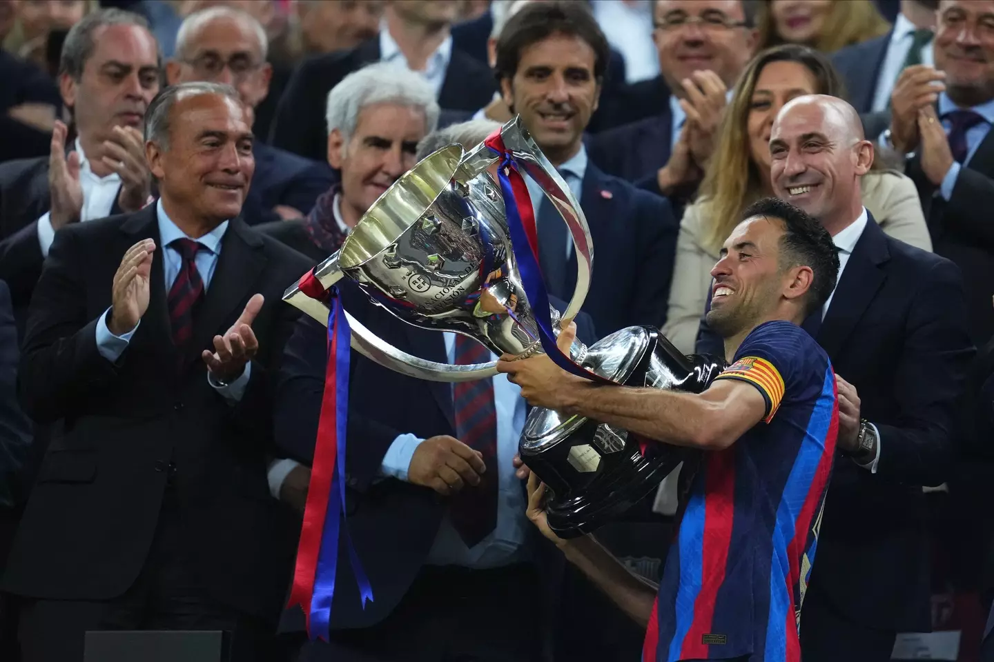 Sergio Busquets and the La Liga trophy. (