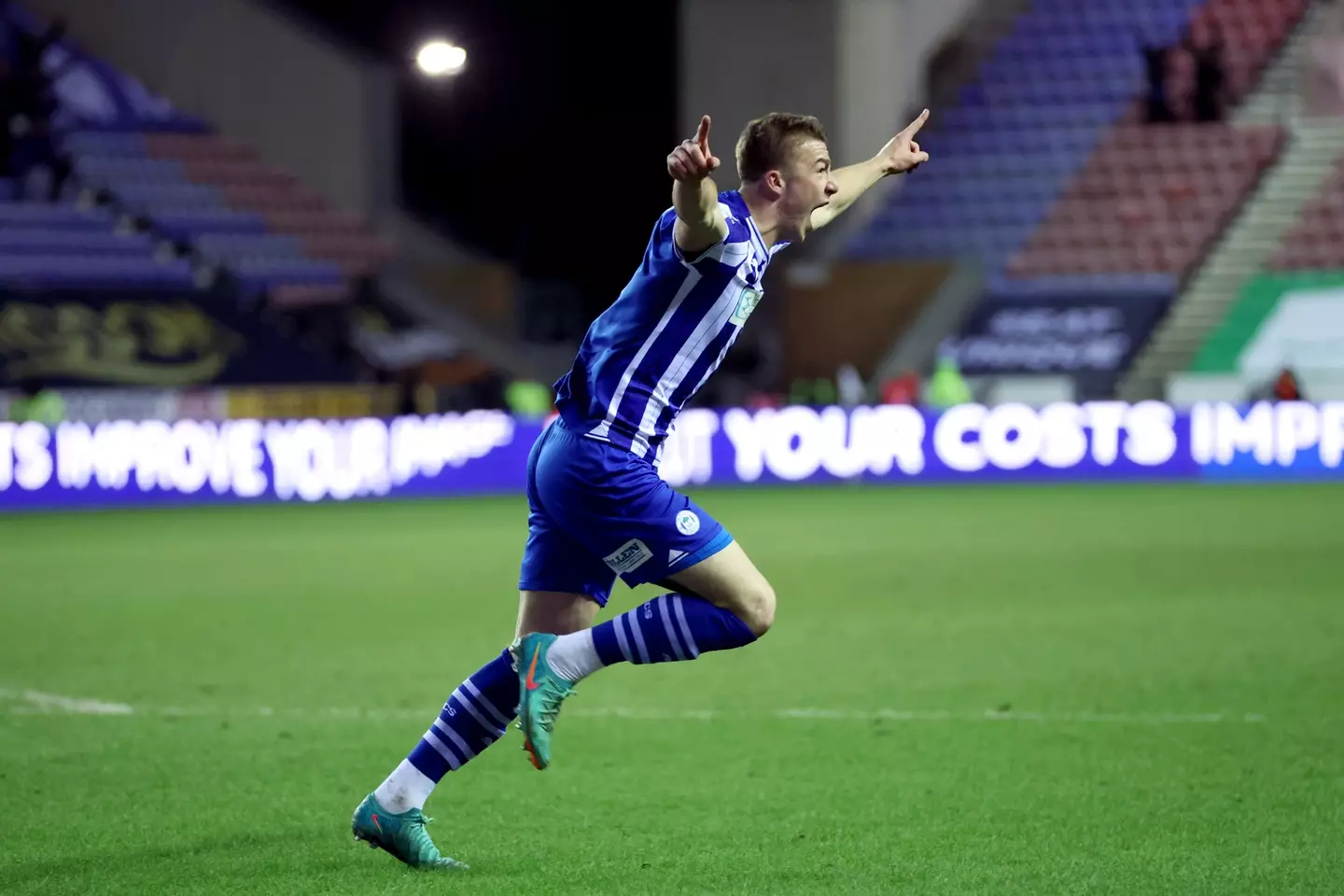 Charlie Hughes wheels away in celebration. Image: Getty