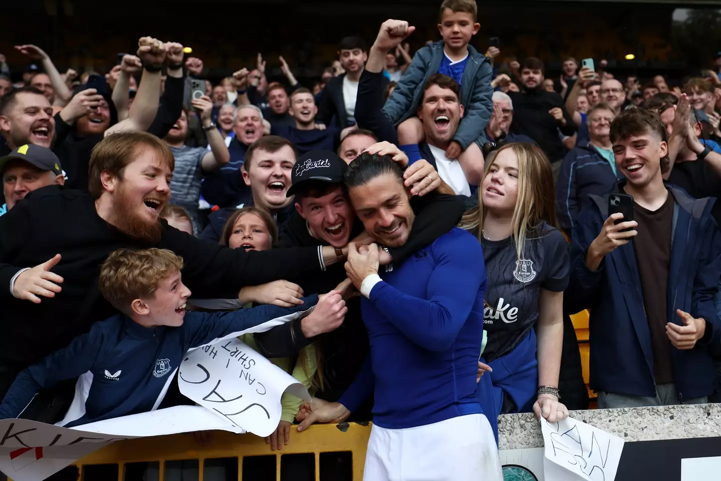 Jack Grealish embraces Everton fans (Image: Getty)