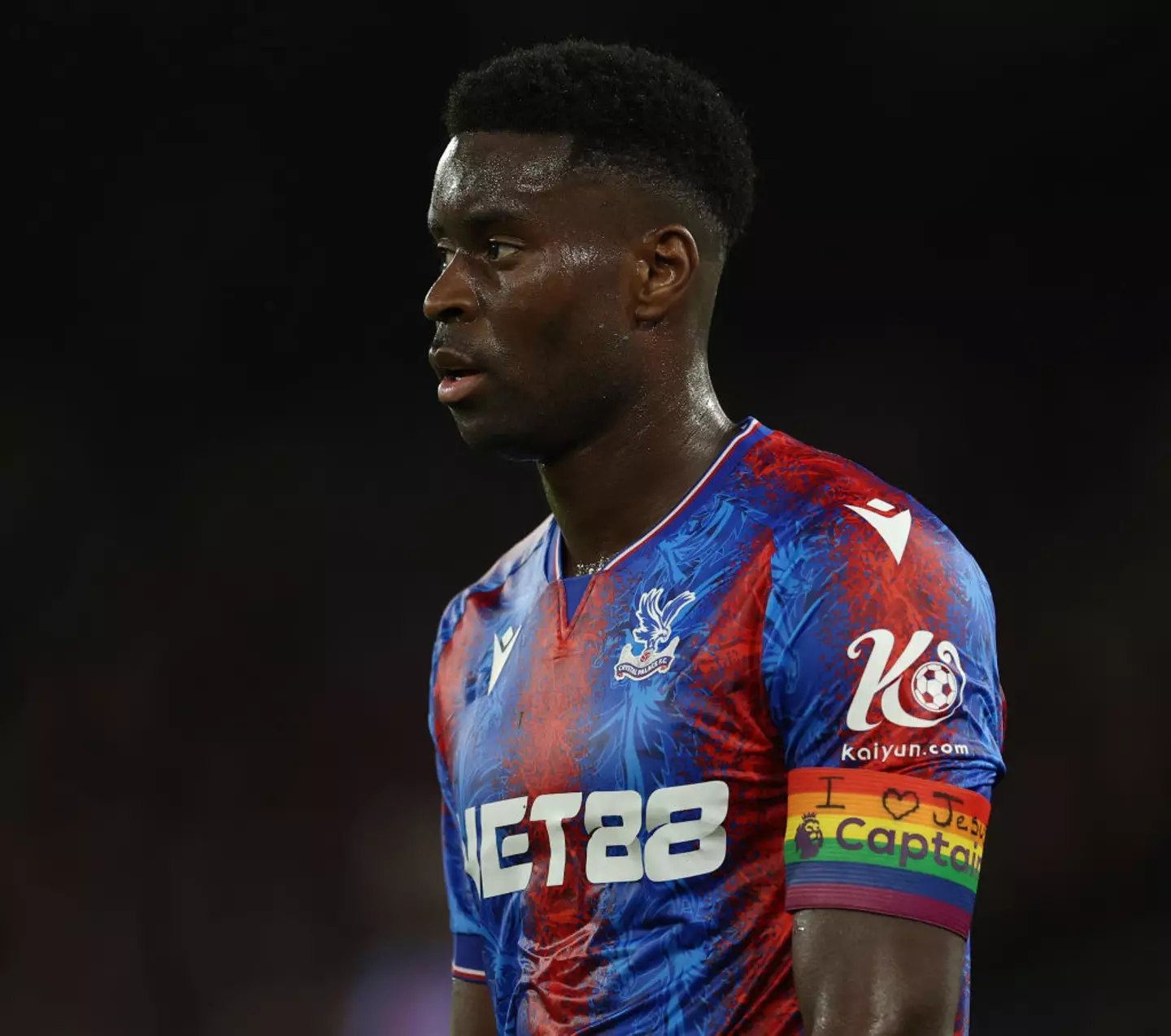 Guehi wrote the message on his armband against Ipswich (Image: Getty)