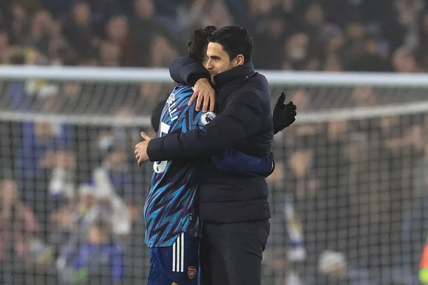 Mikel Arteta and Gabriel Martinelli of Arsenal embrace each other. (Alamy)