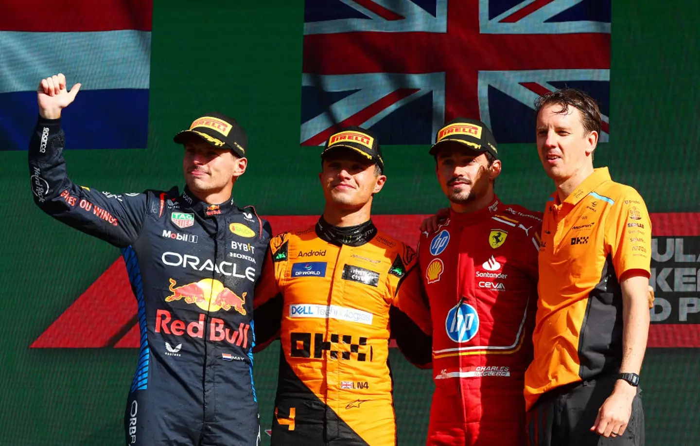 Max Verstappen, Lando Norris, Charles Leclerc and McLaren race engineer Will Joseph on the podium after the Dutch GP -