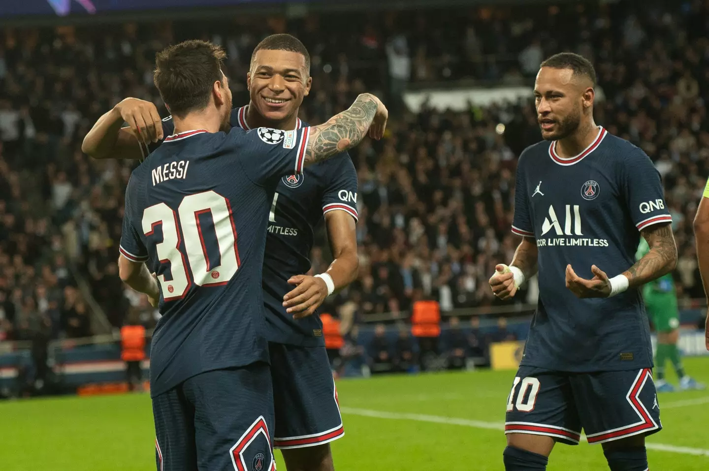 Mbappe, Messi and Neymar celebrate the Argentine's first goal for PSG. Image: PA Images