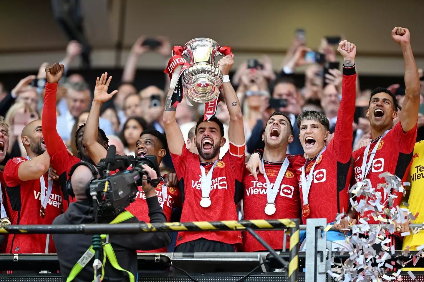 Bruno Fernands holds aloft the FA Cup trophy after Manchester United's victory. Image: Getty