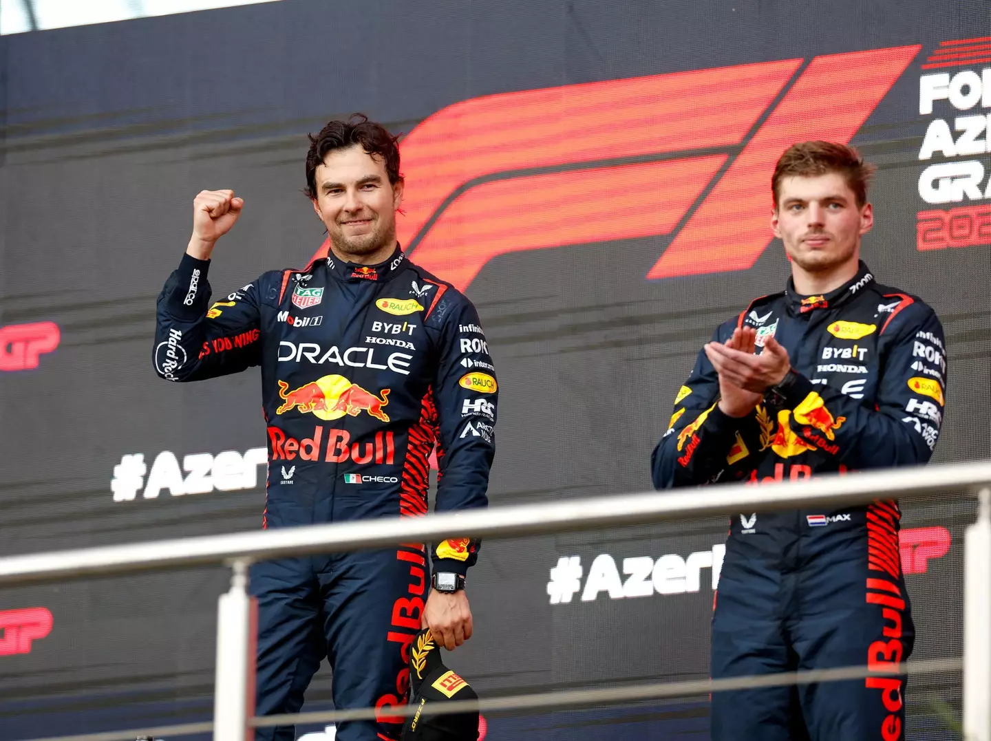 Perez and Verstappen on the podium. Image: Alamy