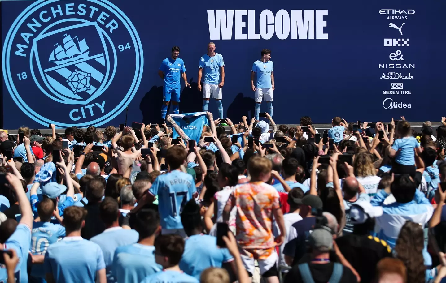 Erling Haaland, Stefan Ortega, and Julian Alvarez meet Manchester City fans. Sportimage / Alamy