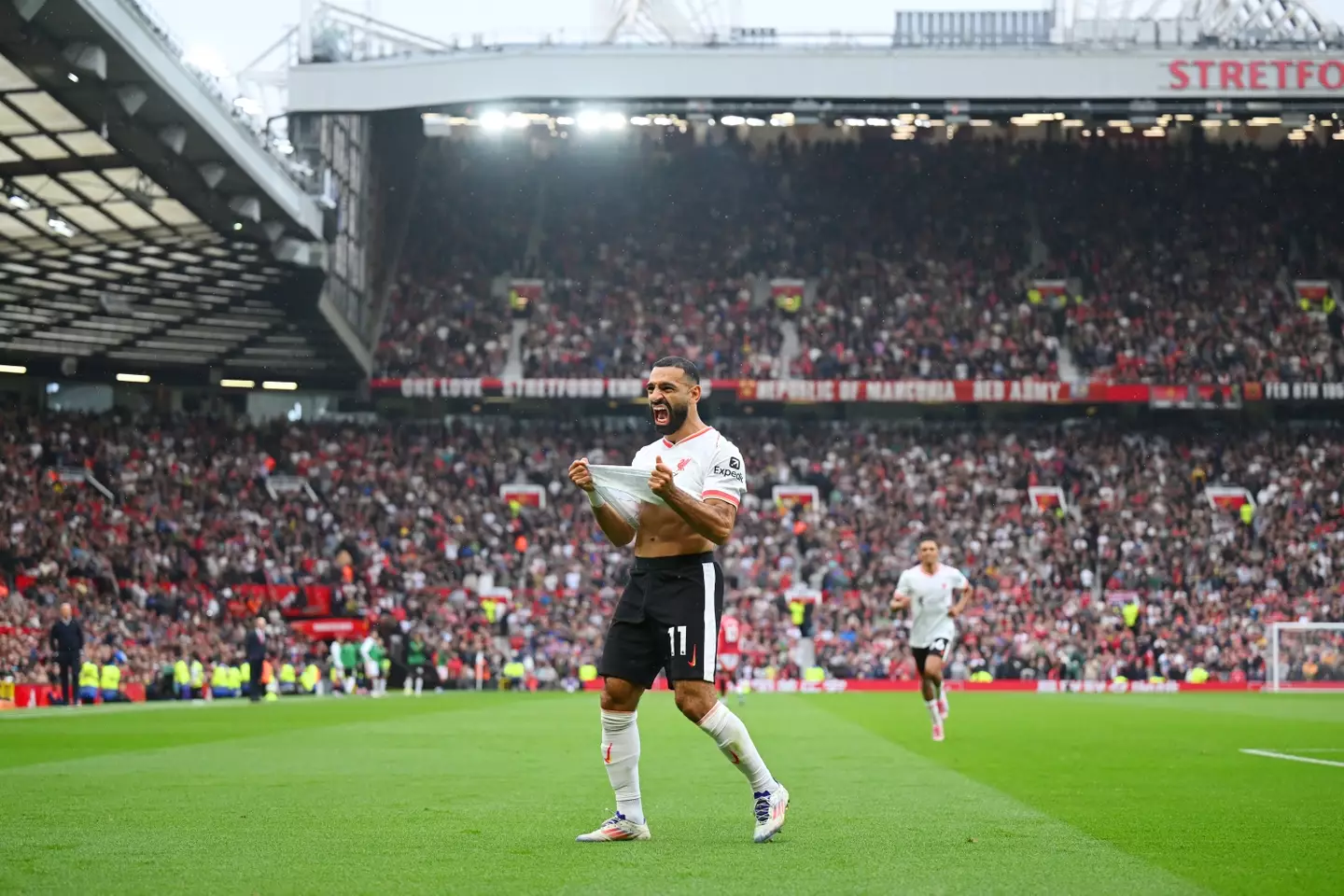Mohamed Salah celebrates scoring a goal against Manchester United at Old Trafford. Image: Getty