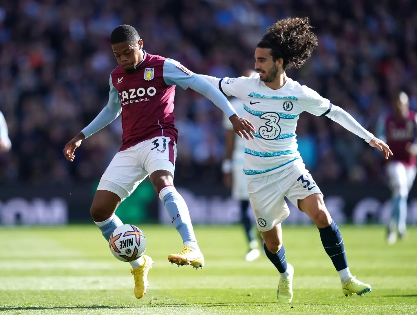 Aston Villa's Leon Bailey (left) and Chelsea's Marc Cucurella battle for the ball during the Premier League match at Villa Park. (Alamy)