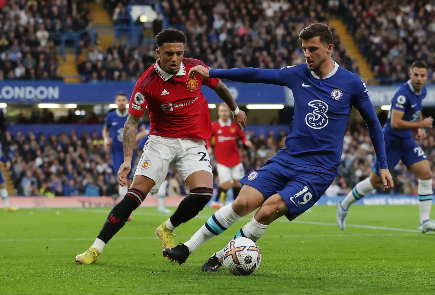 Mason Mount of Chelsea and Jadon Sancho of Manchester United challenge for the ball during the Premier League match at Stamford Bridge. (Alamy)