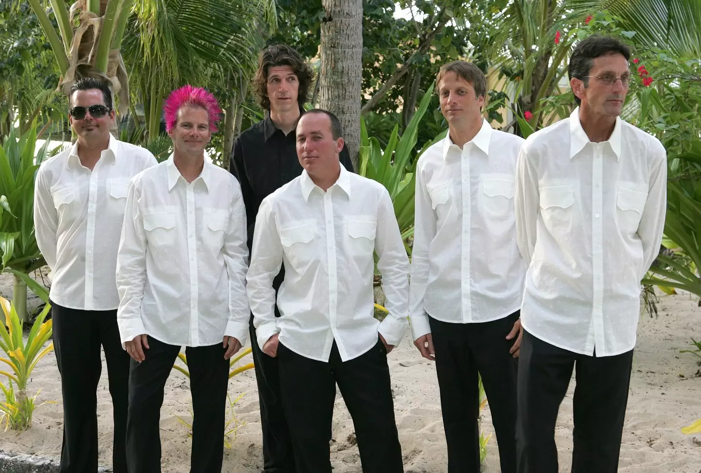 Tony Hawk (second from right) pictured at his 2006 wedding to Lhotse Merriam in Fiji (Image: Getty/Mark Epstein)