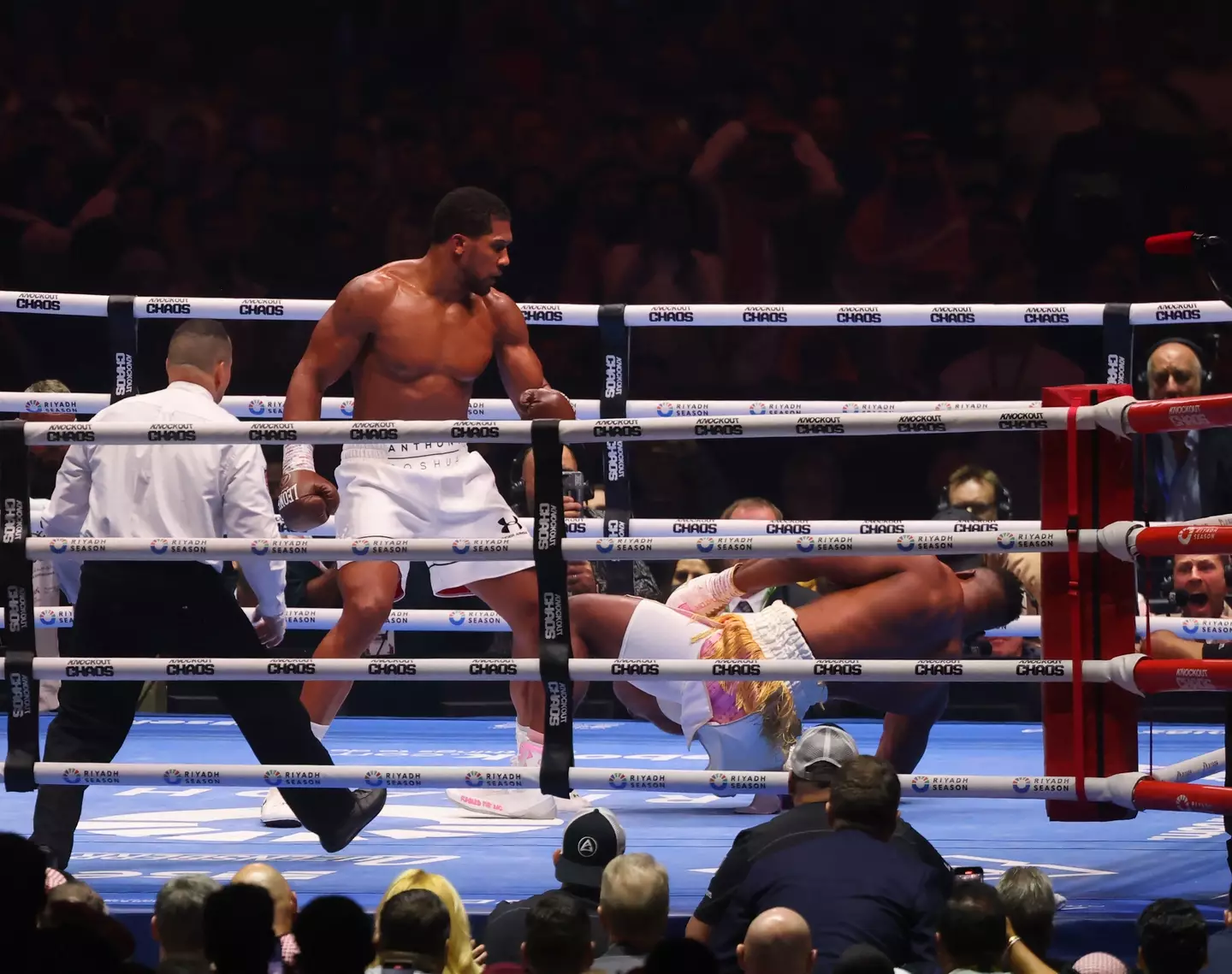 Anthony Joshua drops Francis Ngannou during their bout. Image: Getty