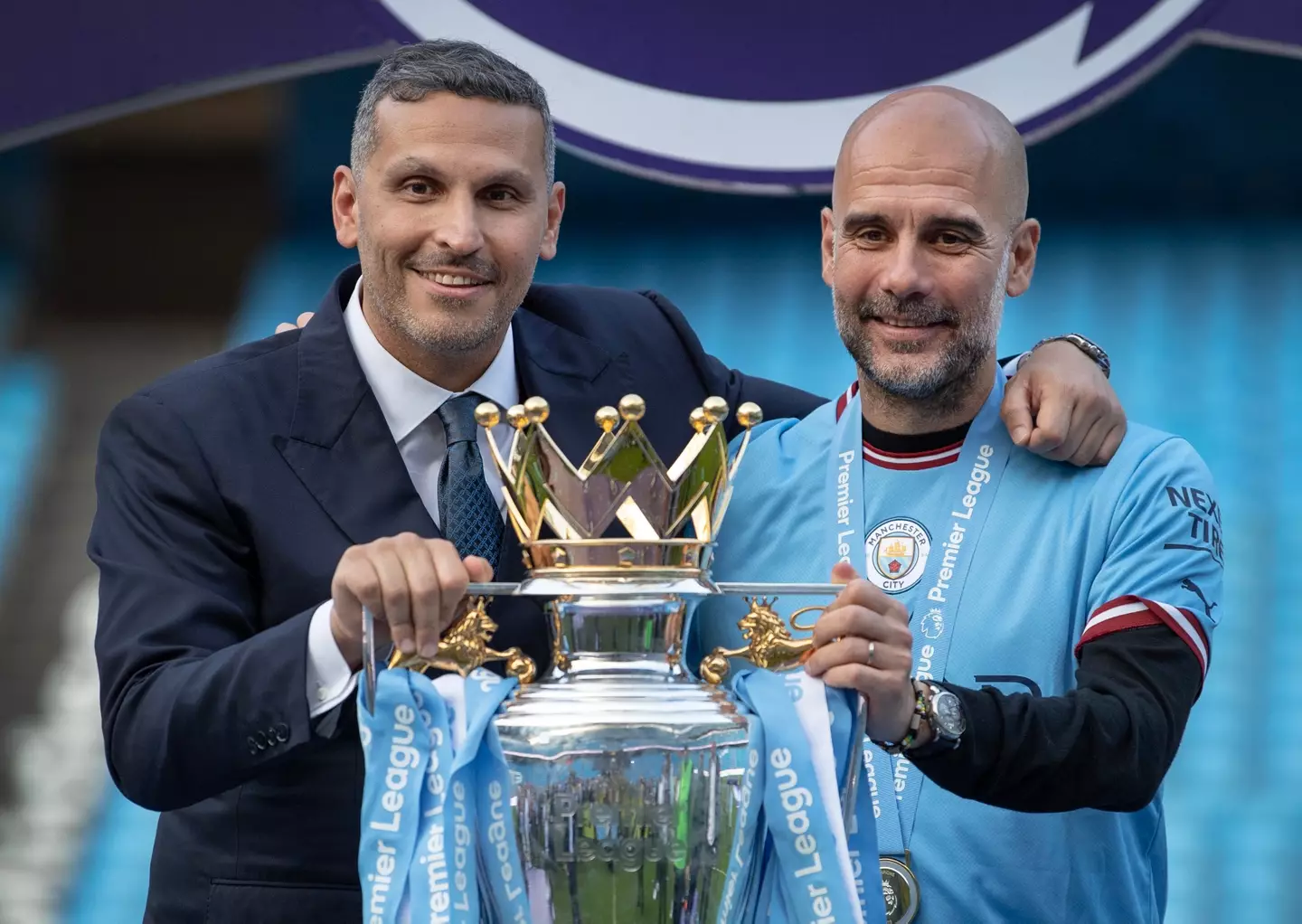 Manchester City chairman Khaldoon Al Mubarak and manager Pep Guardiola with the Premier League title. Image: Getty
