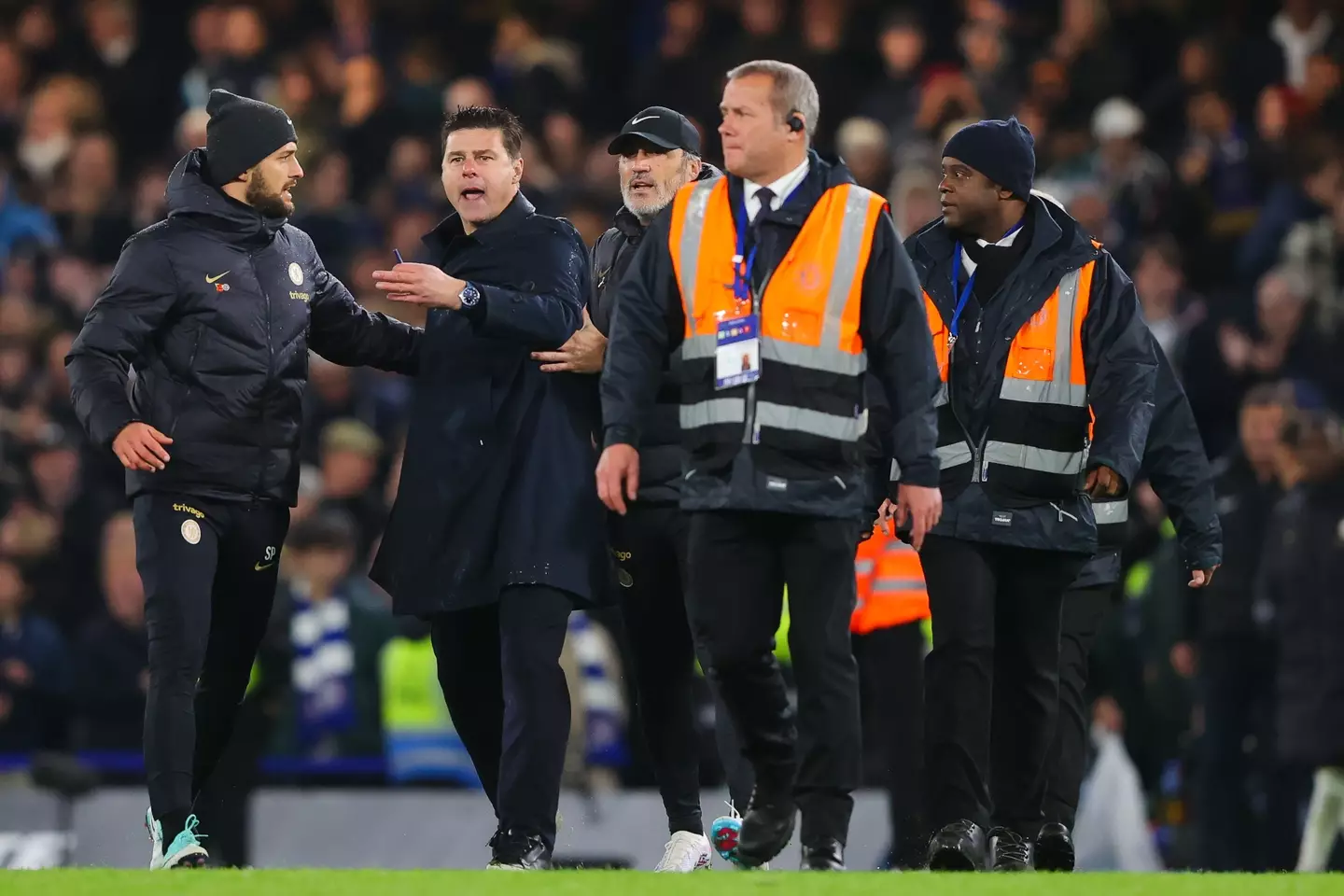 Pochettino attempting to approach Taylor at full-time. (Image