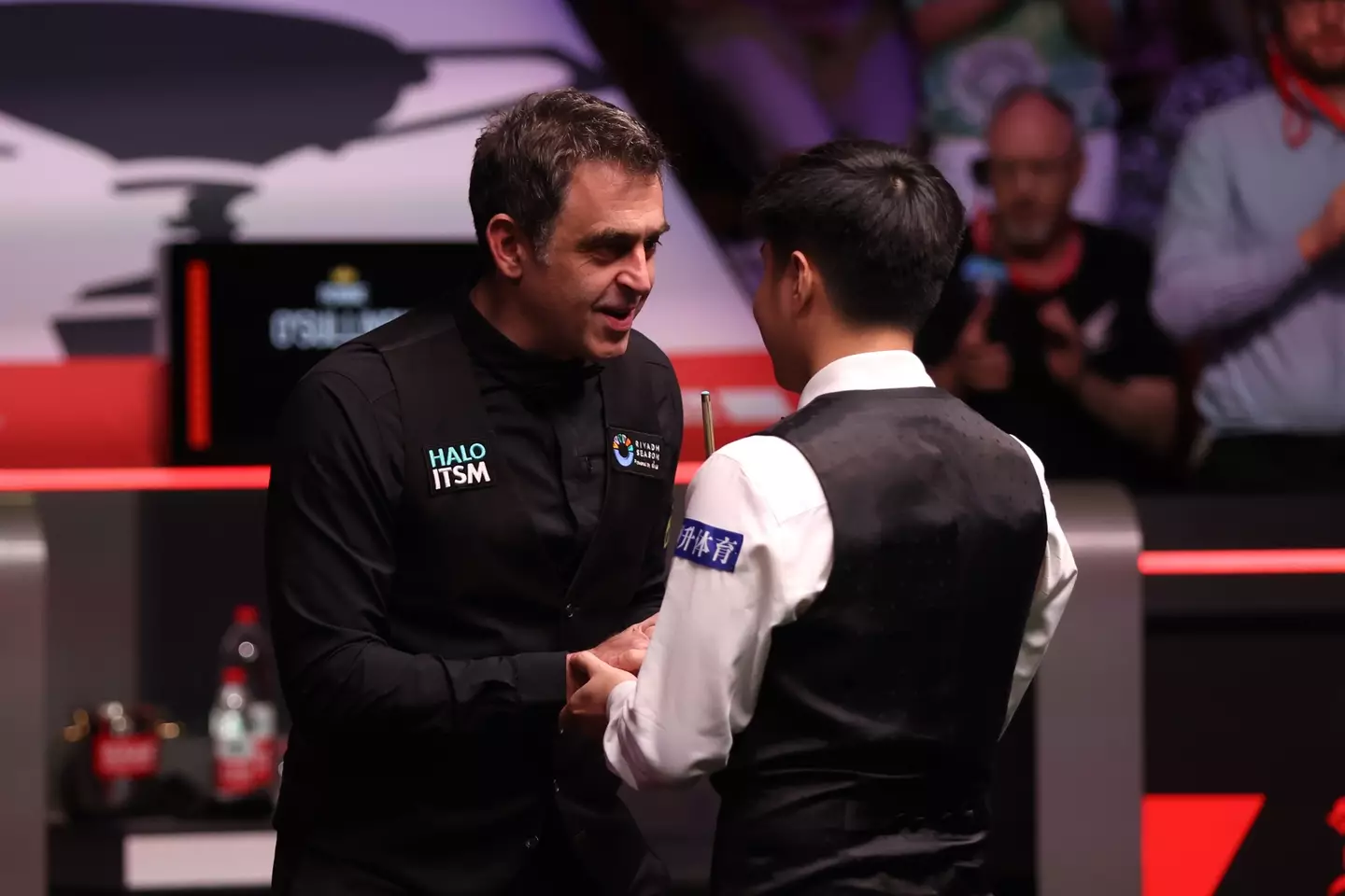 Ronnie O'Sullivan and Zhao Xintong shared a warm embrace following their match. Image: Getty