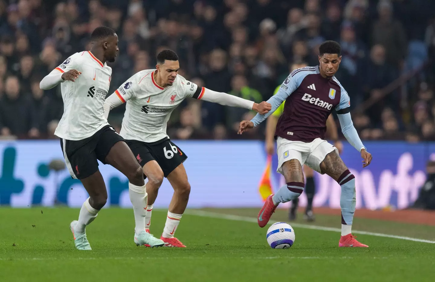 Trent Alexander-Arnold and Marcus Rashford during last season's fixture between Aston Villa vs. Liverpool. Image: Getty
