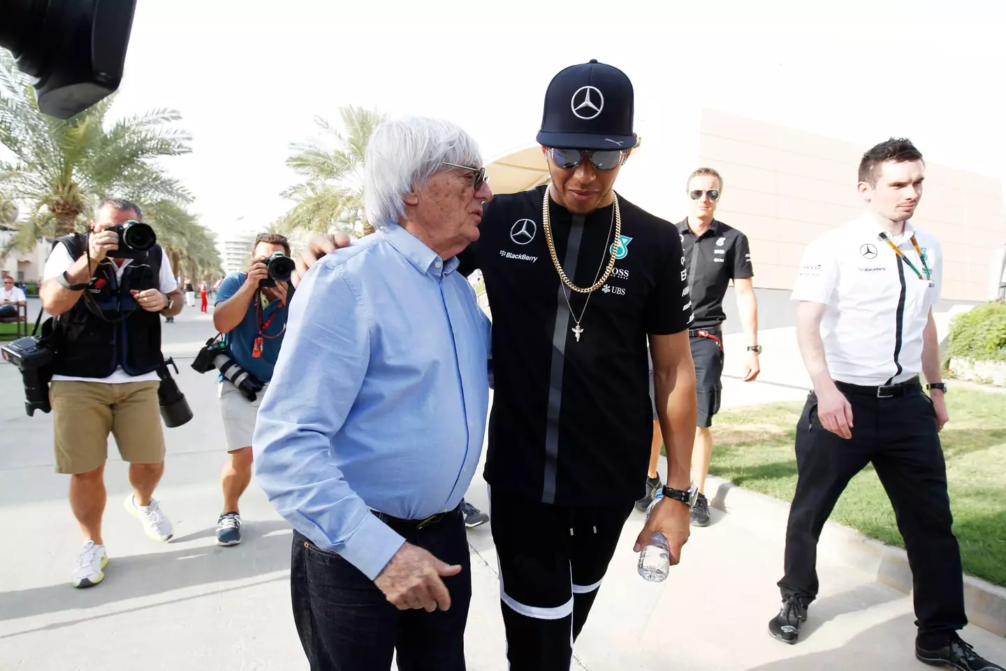 Hamilton talking to Ecclestone in 2015. Image: Alamy