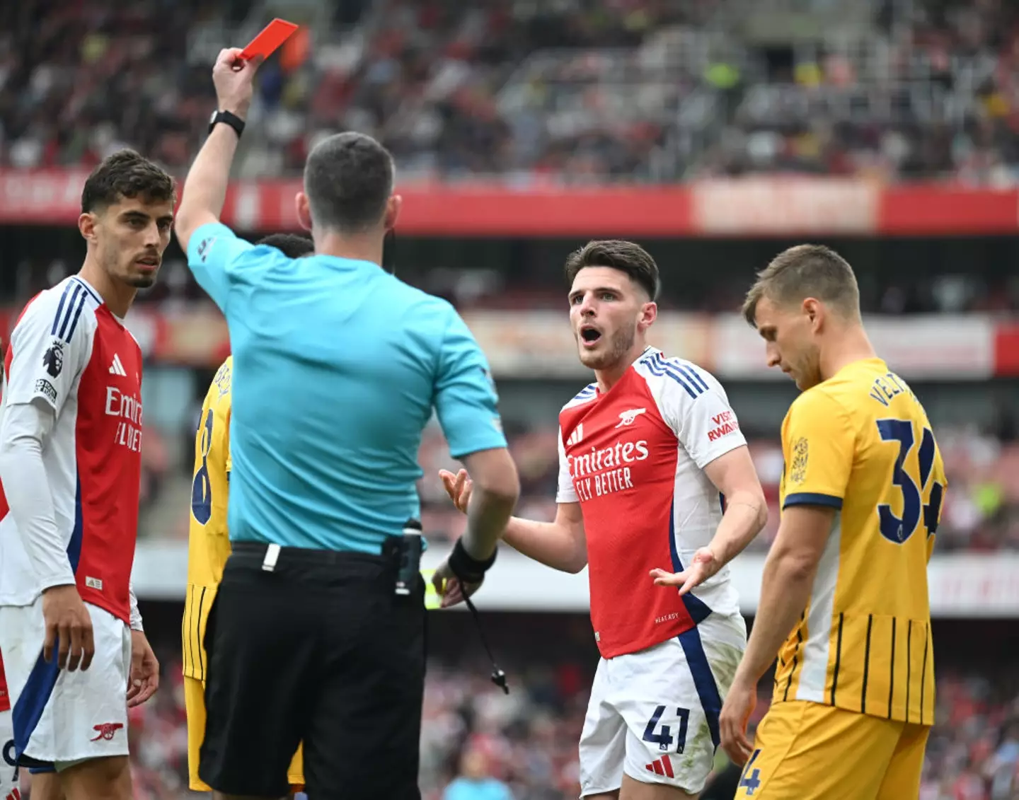 Declan Rice will miss Arsenal's next Premier League match against Tottenham Hotspur after being shown a red card vs Brighton. (Image: Getty)