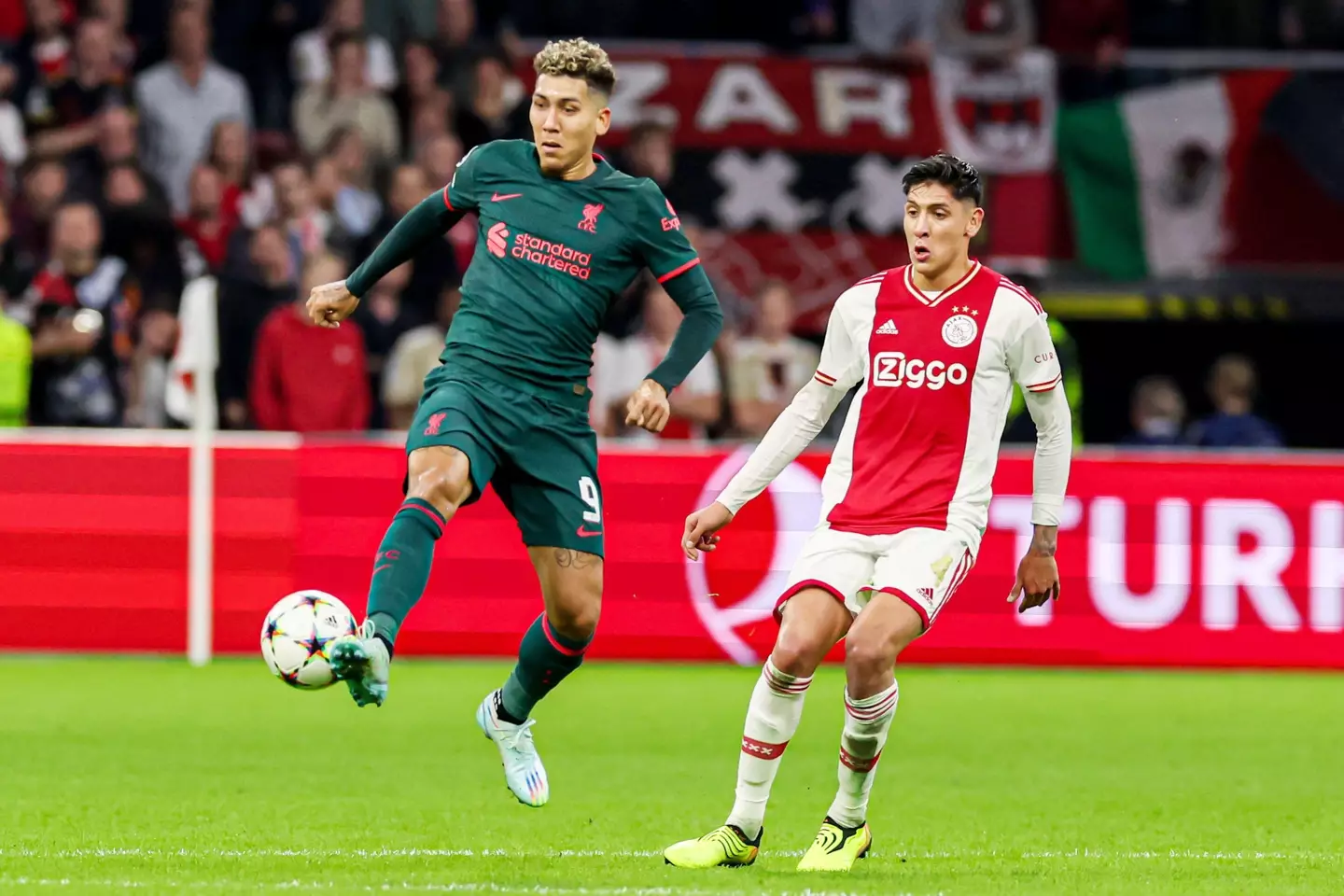 Roberto Firmino pictured in Champions League action for Liverpool (