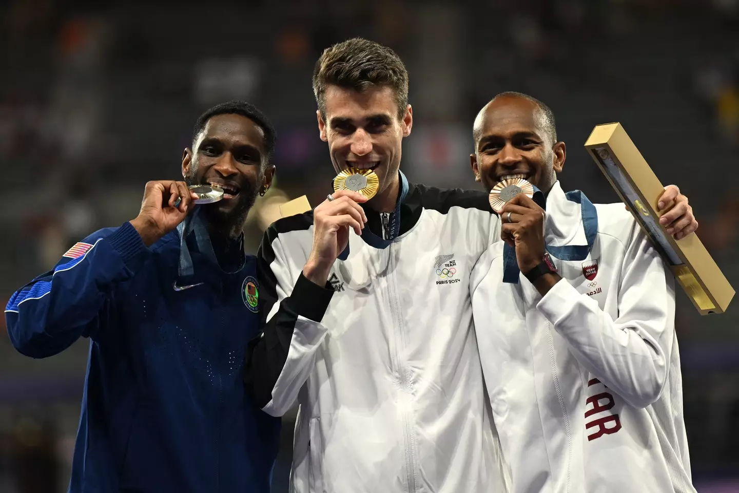 Shelby McEwen and Hamish Kerr celebrate their medal successes