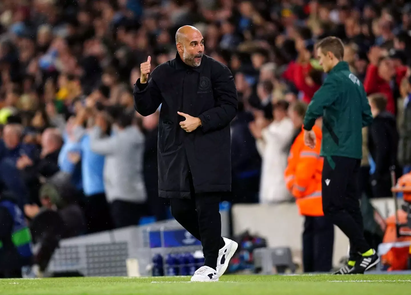 Manchester City manager Pep Guardiola on the touchline.