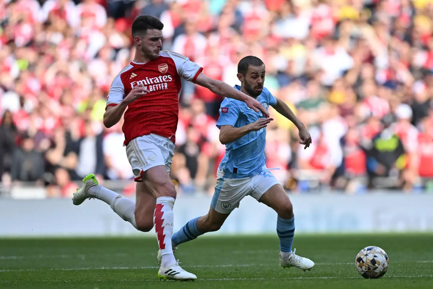 Bernardo Silva and Declan during a match between Arsenal and Manchester City. Image: Getty