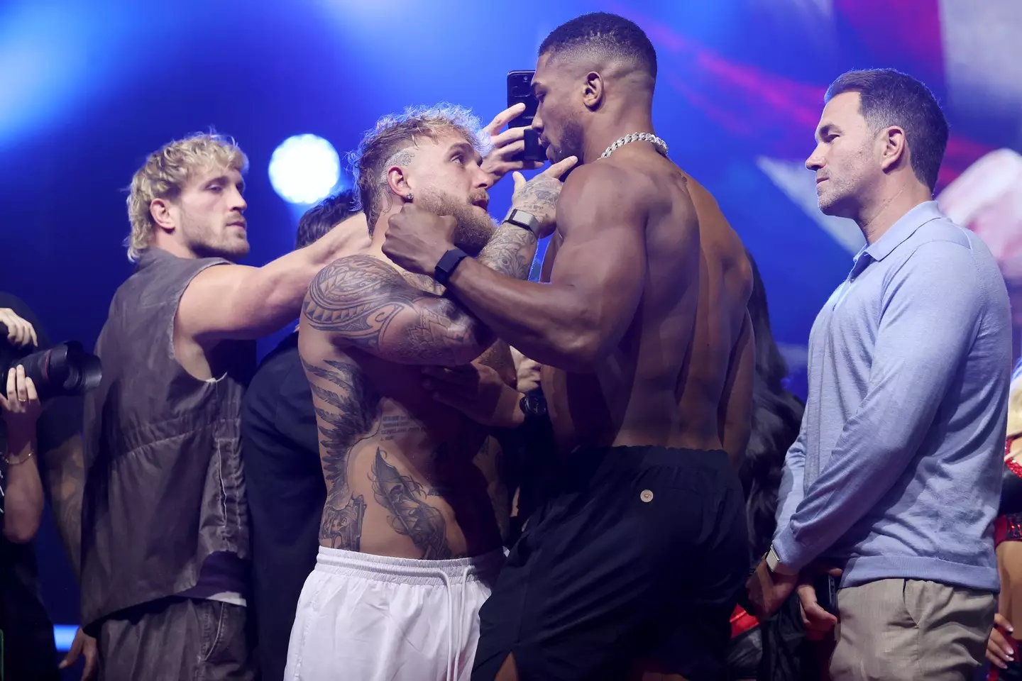 Jake Paul and Anthony Joshua at the ceremonial weigh-in (Image: Getty)