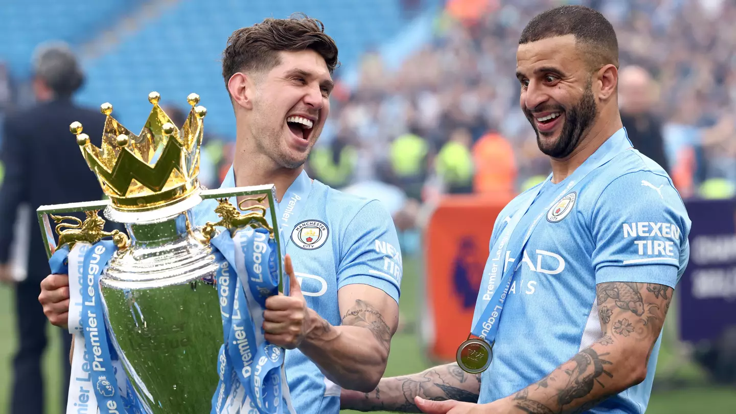 John Stones and Kyle Walker celebrate winning the Premier League (Sportimage / Alamy)