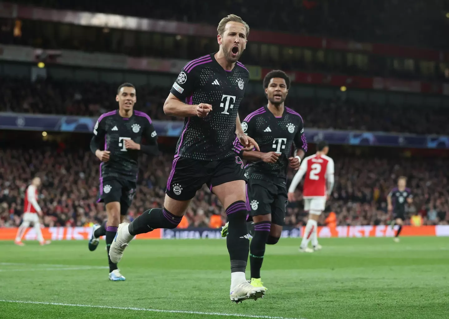 Harry Kane wheels away in celebration after scoring against Arsenal. Image: Getty 