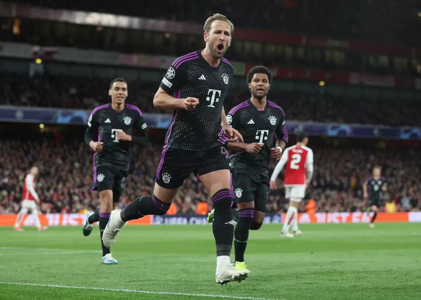 Harry Kane wheels away in celebration after scoring against Arsenal. Image: Getty