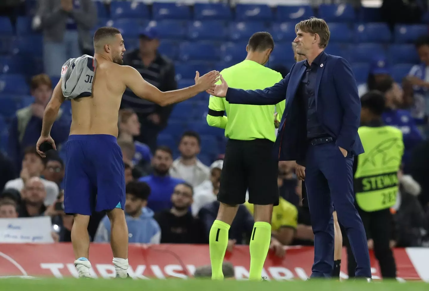 Christoph Freund shakes hands with Mateo Kovacic of Chelsea after the UEFA Champions League match at Stamford Bridge. (Alamy)