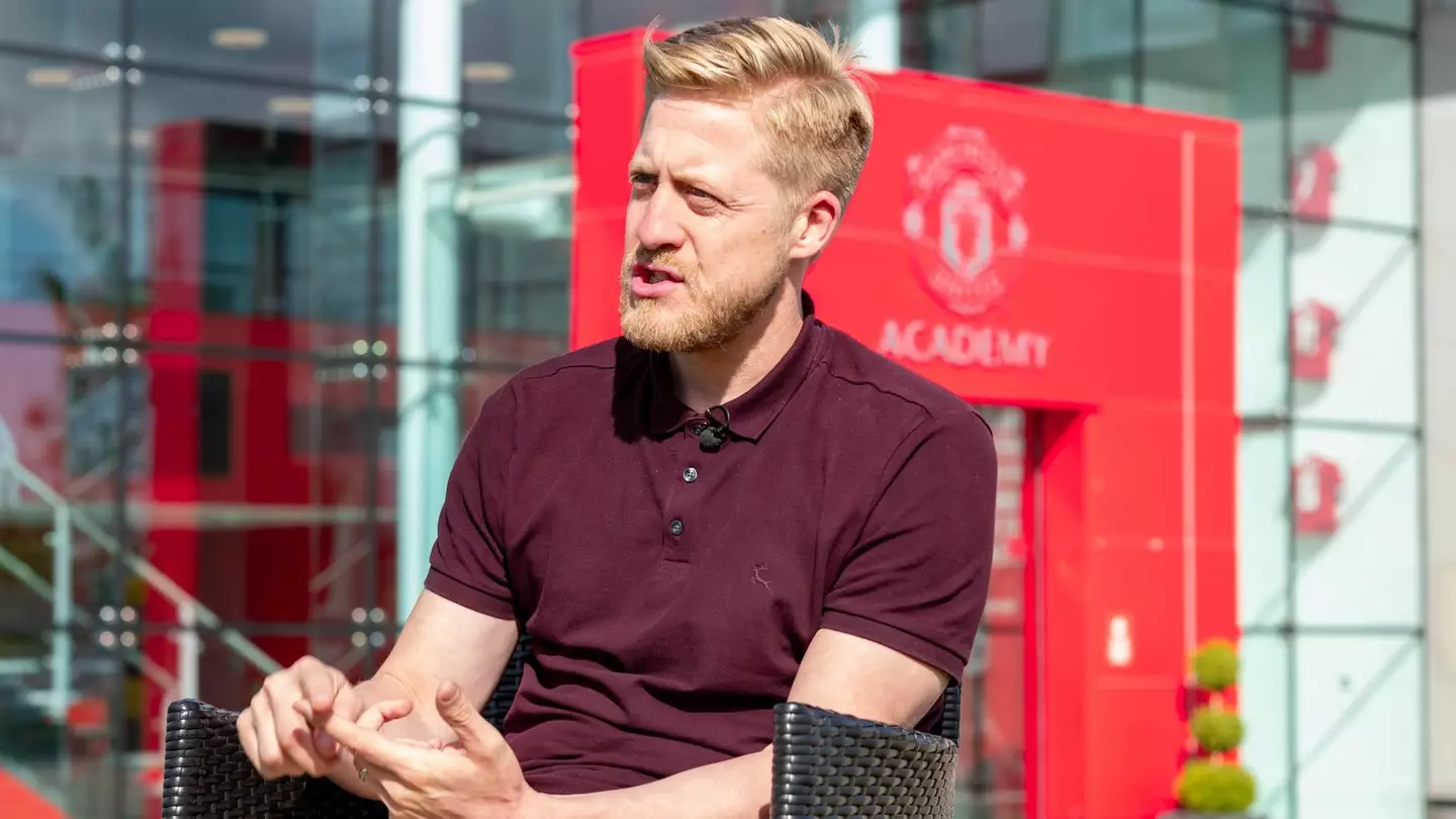 Nick Cox speaking to reporters (Manchester United)