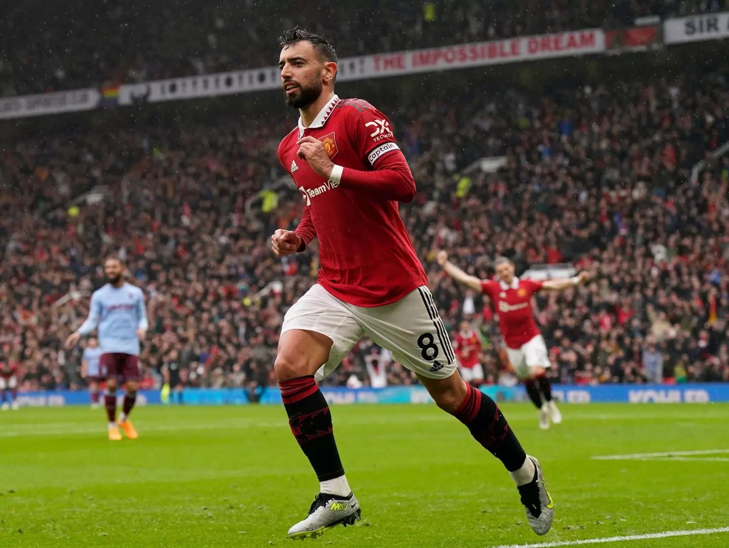 Bruno Fernandes wheels away in celebration. Image; Alamy