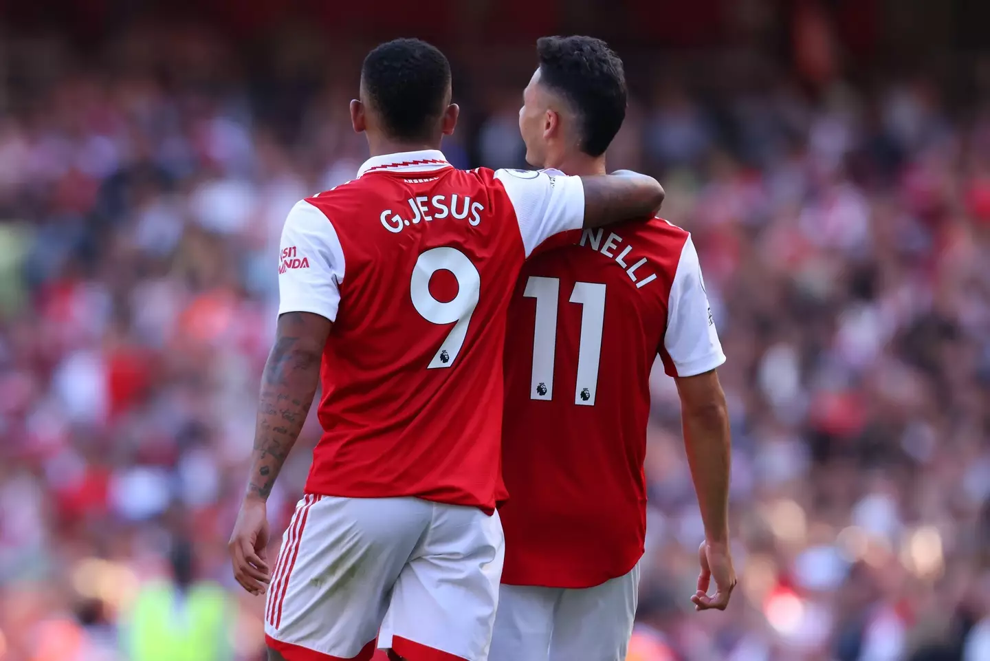 Jesus and Martinelli celebrate.