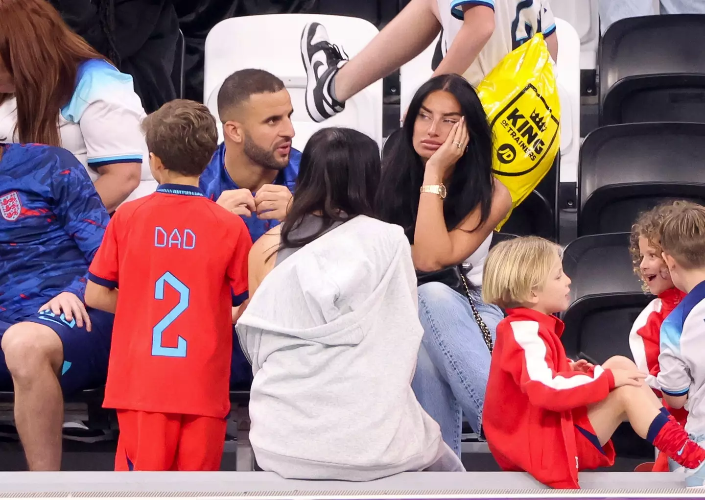 Kyle Walker and Annie Kilner following England's defeat to France at the 2022 World Cup. Image: Getty