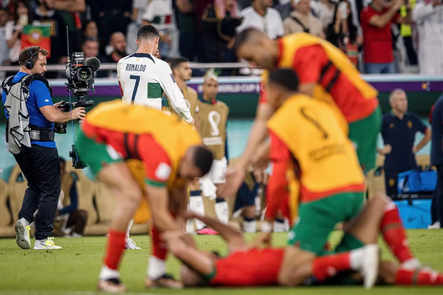 A gutted Ronaldo leaves the pitch as Morocco celebrate. Image: Alamy