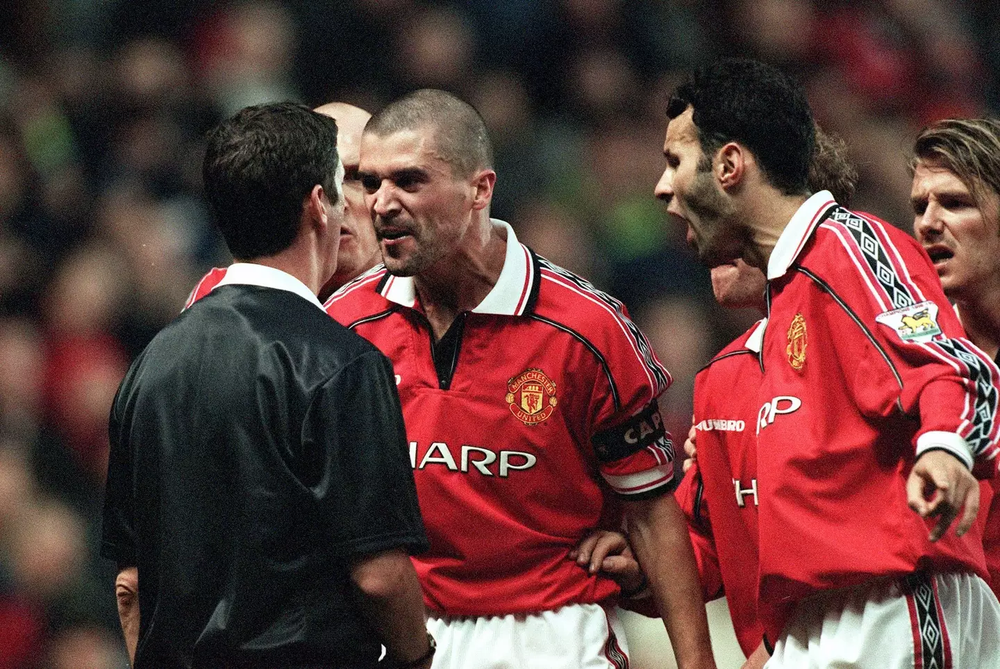 Keane arguing with a referee. (Image