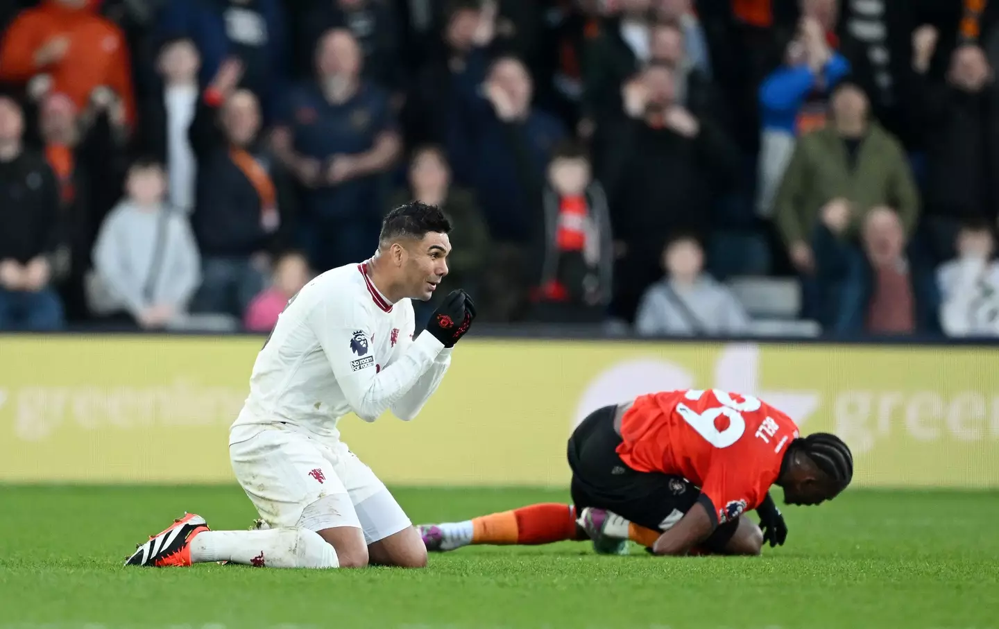 Casemiro reacts after being shown a yellow card. Image: Getty 