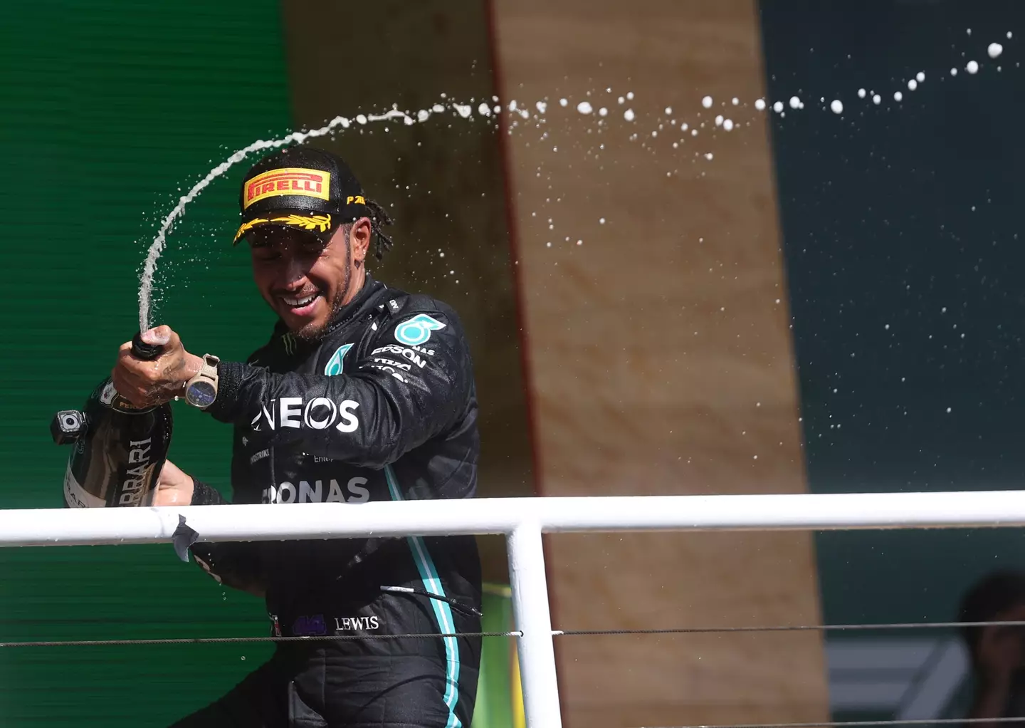 Hamilton celebrates his famous win. Image: PA Images