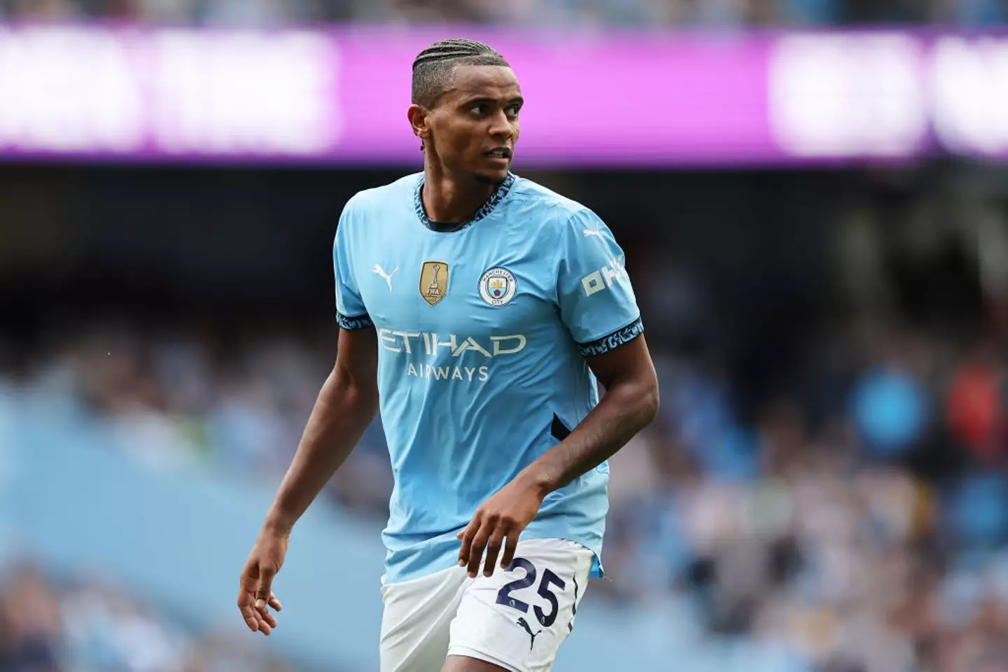 Manuel Akanji in action for Man City -