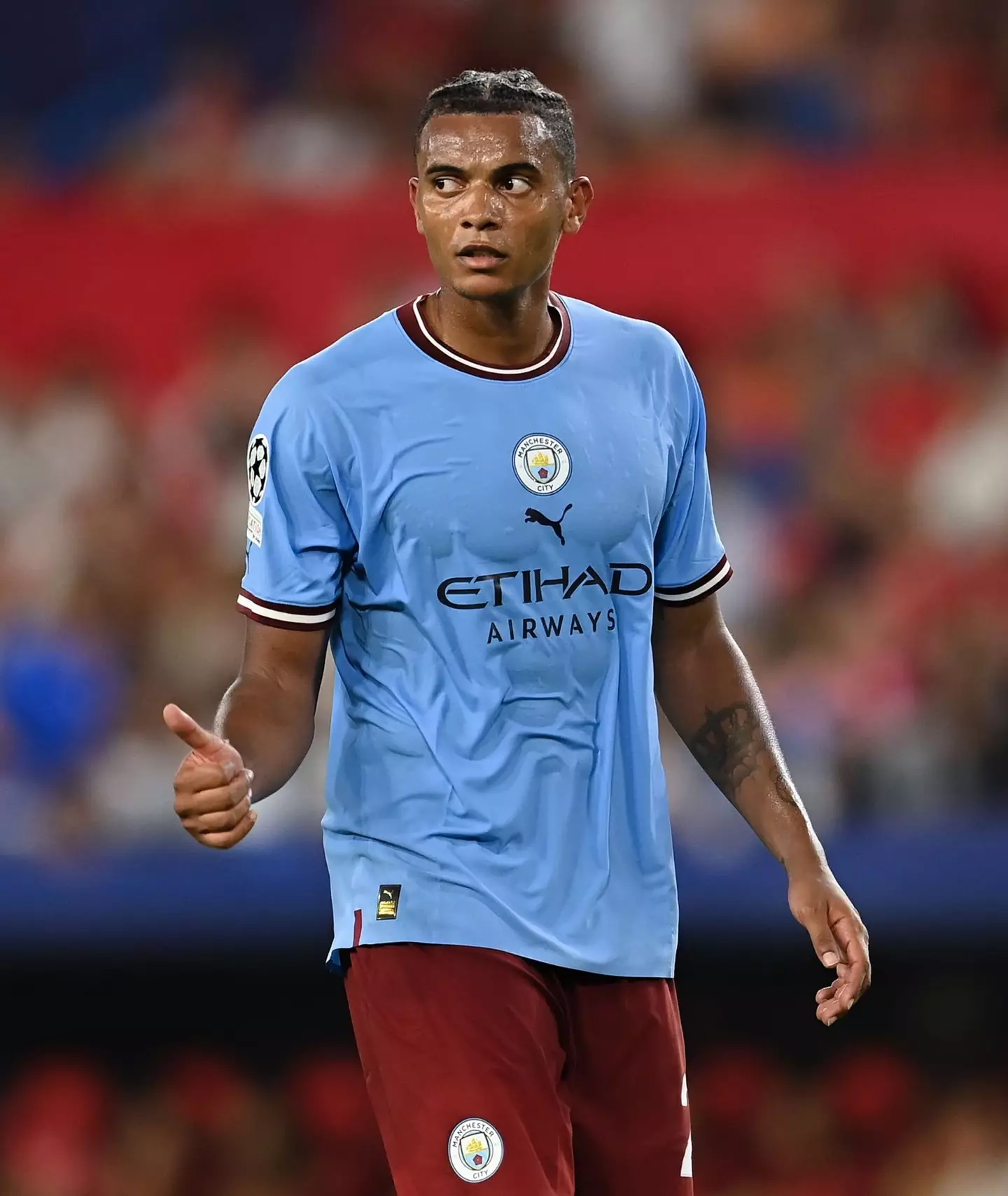 Manuel Akanji in Champions League action for Manchester City (Alamy)