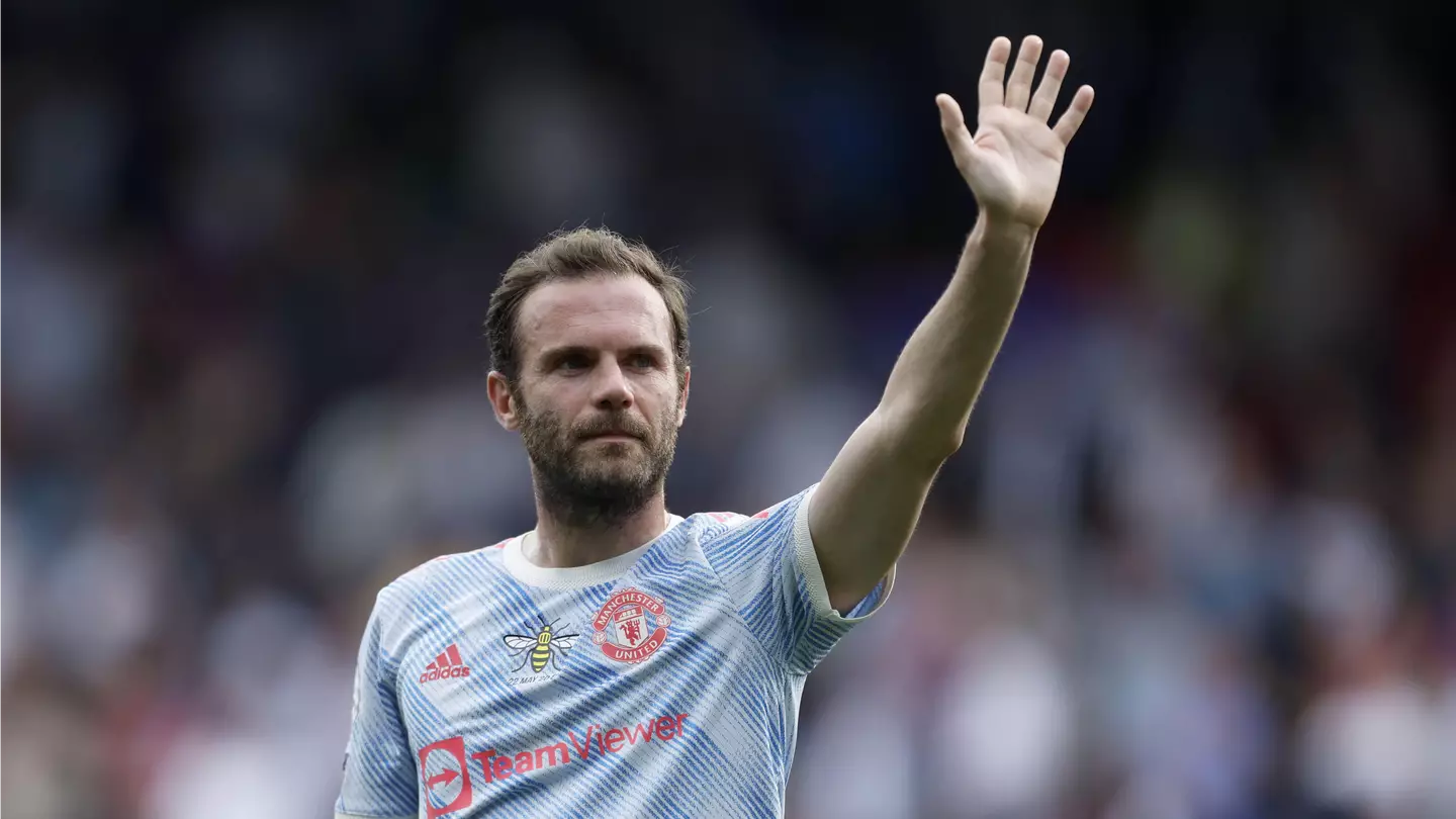 Juan Mata waves farewell to the traveling Manchester United supporters after his last appearance for the club against Crystal Palace.
