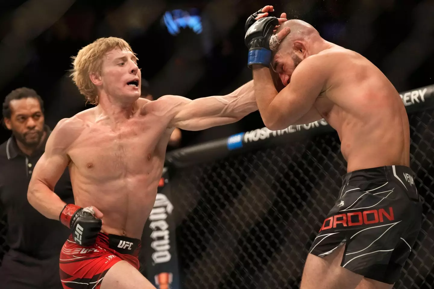 Paddy Pimblett lands a punch on Jared Gordon during their lightweight bout at UFC 282. Image: Alamy