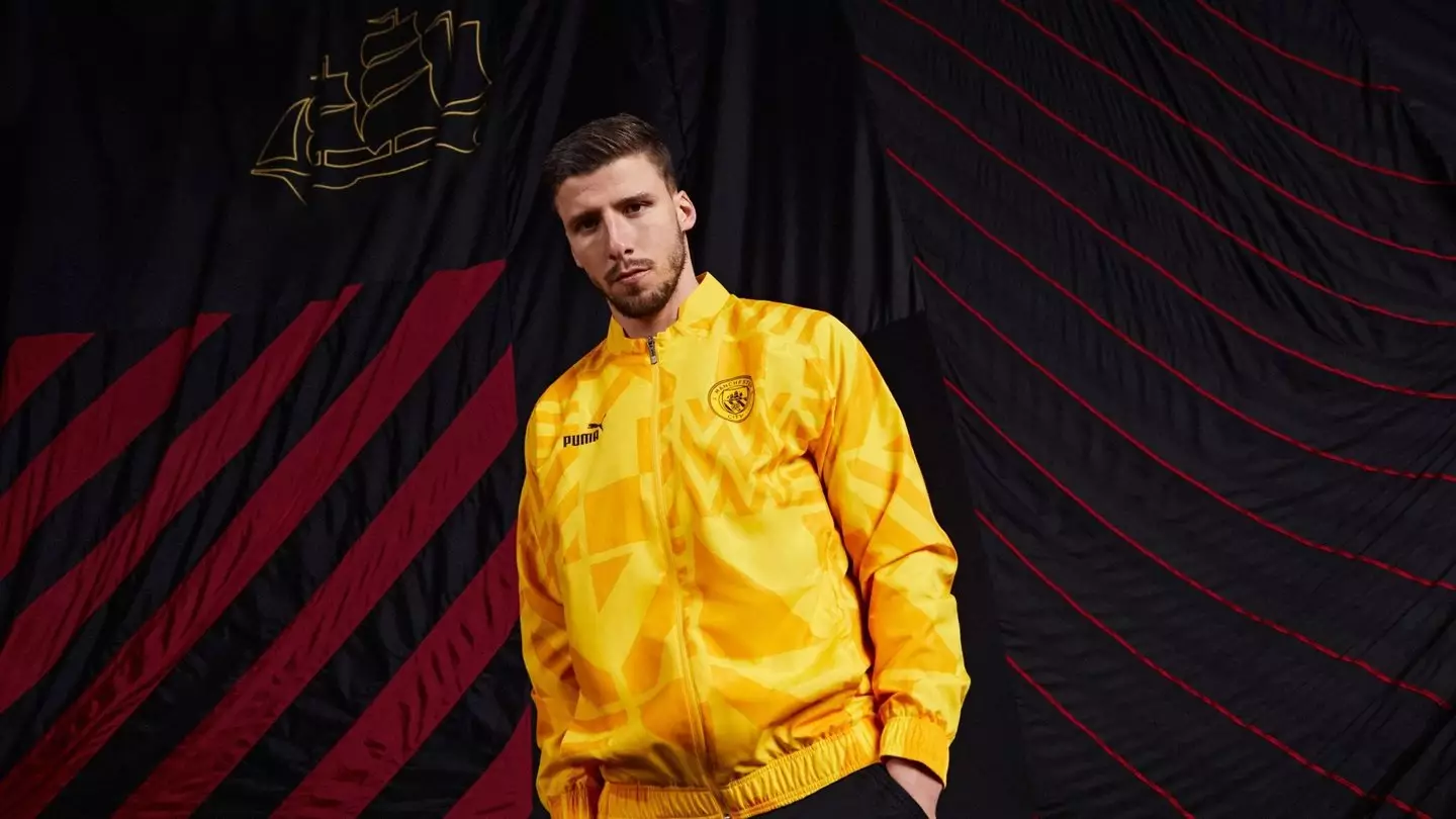 Ruben Dias teases the away kit training training jacket (Manchester City / ManCity.com)