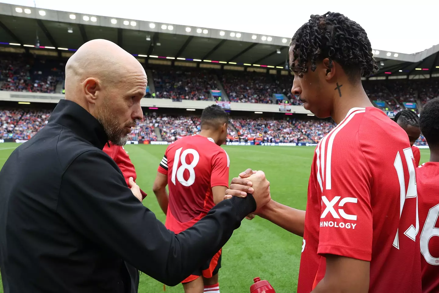 Erik ten Hag with new signing Leny Yoro. (