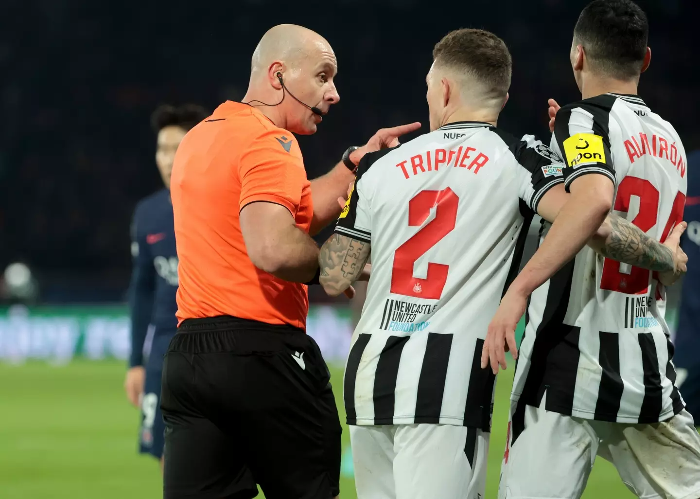 Kieran Trippier and Miguel Almiron couldn't believe the decision. (Image