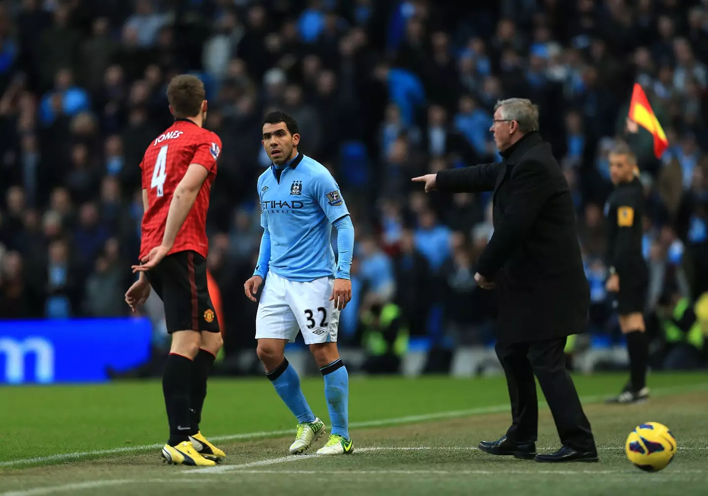 Phil Jones of Manchester United with Sir Alex Ferguson on the touchline. (Alamy)