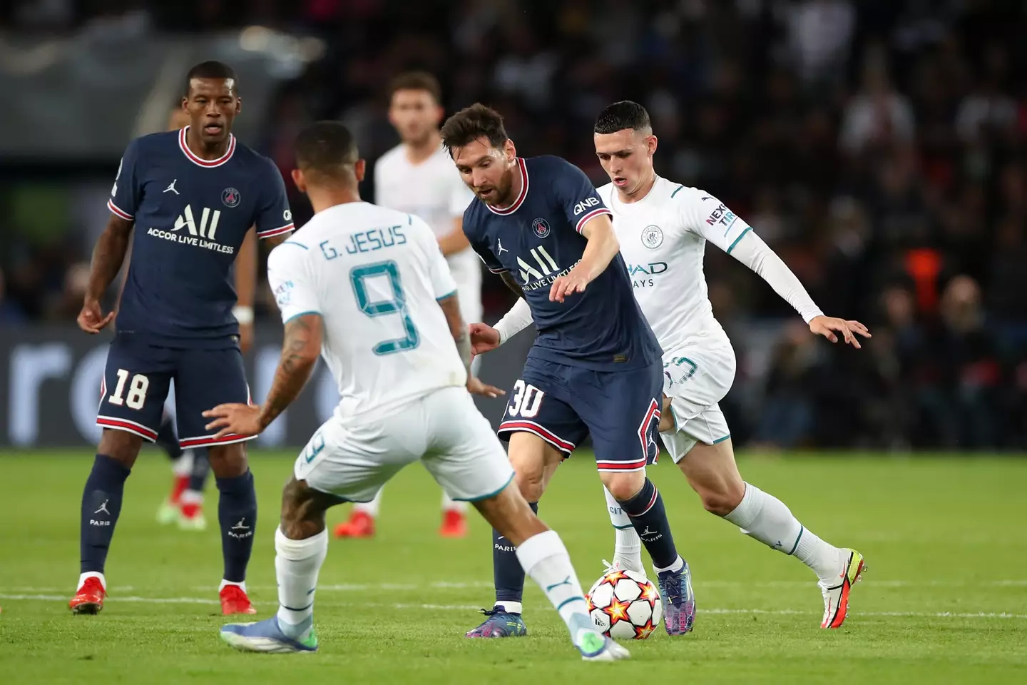 Foden playing against Messi in a Champions League game in 2021. (Image